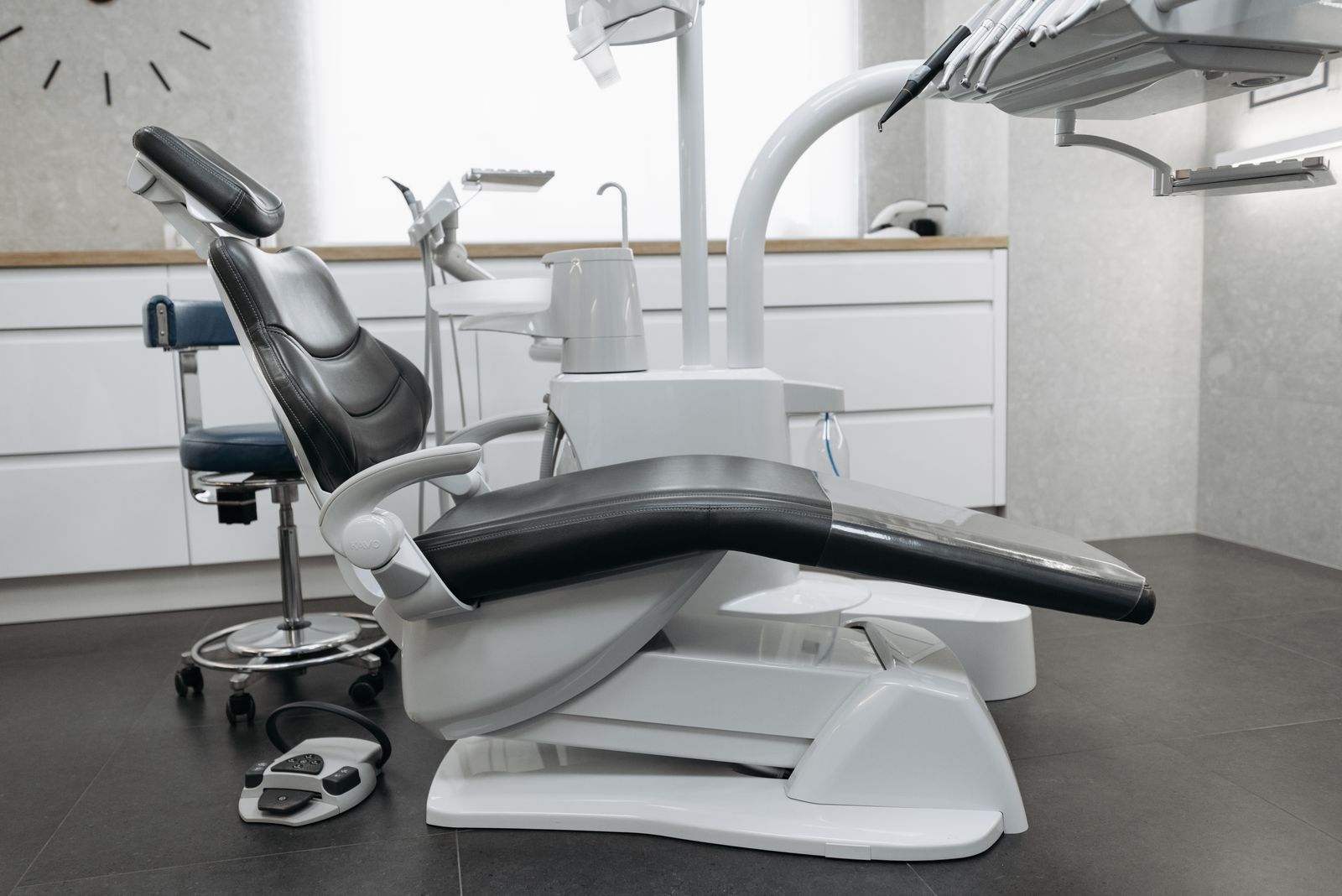 Stock photo of a bright modern dental treatment room with no people shown
